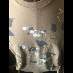 Mens tee - short sleeves. Mens large. Can be unisex. Floral design. 29 inch. L.